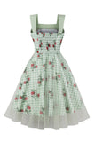 Robe verte à carreaux des années 50 avec imprimé floral