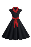 Robe noire à pois swing des années 50 avec nœud
