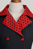 Robe noire à pois swing des années 50 avec nœud