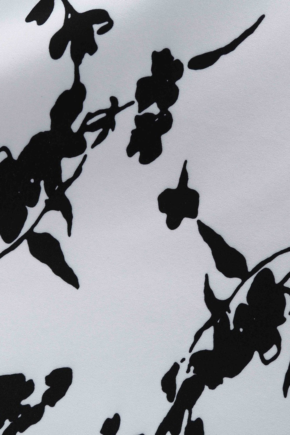 Robe blanche des années 50 imprimée sans manches avec ceinture