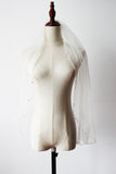 Voile de mariée blanc perlé mi-long fait à la main