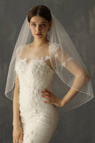 Voile de mariée blanc perlé mi-long fait à la main