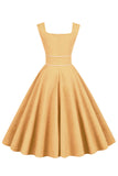 Robe jaune à col carré des années 1950