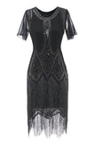 Luxueuse robe à franges perlées à paillettes des années 1920