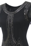 Luxueuse robe à franges perlées à paillettes des années 1920