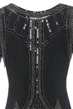 Luxueuse robe à franges perlées à paillettes des années 1920