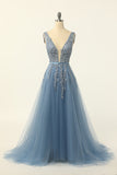 Robe de bal en tulle bleu avec appliques