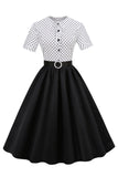 Robe à pois noir et blanc vintage des années 50