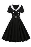 Robe swing noire des années 50 avec ceinture