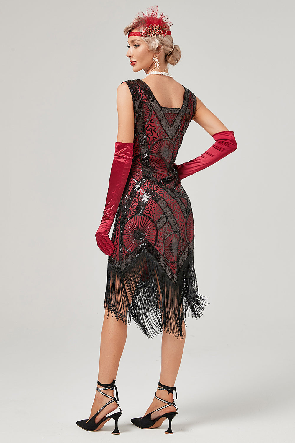 Robe à clapet vert foncé des années 20 avec franges