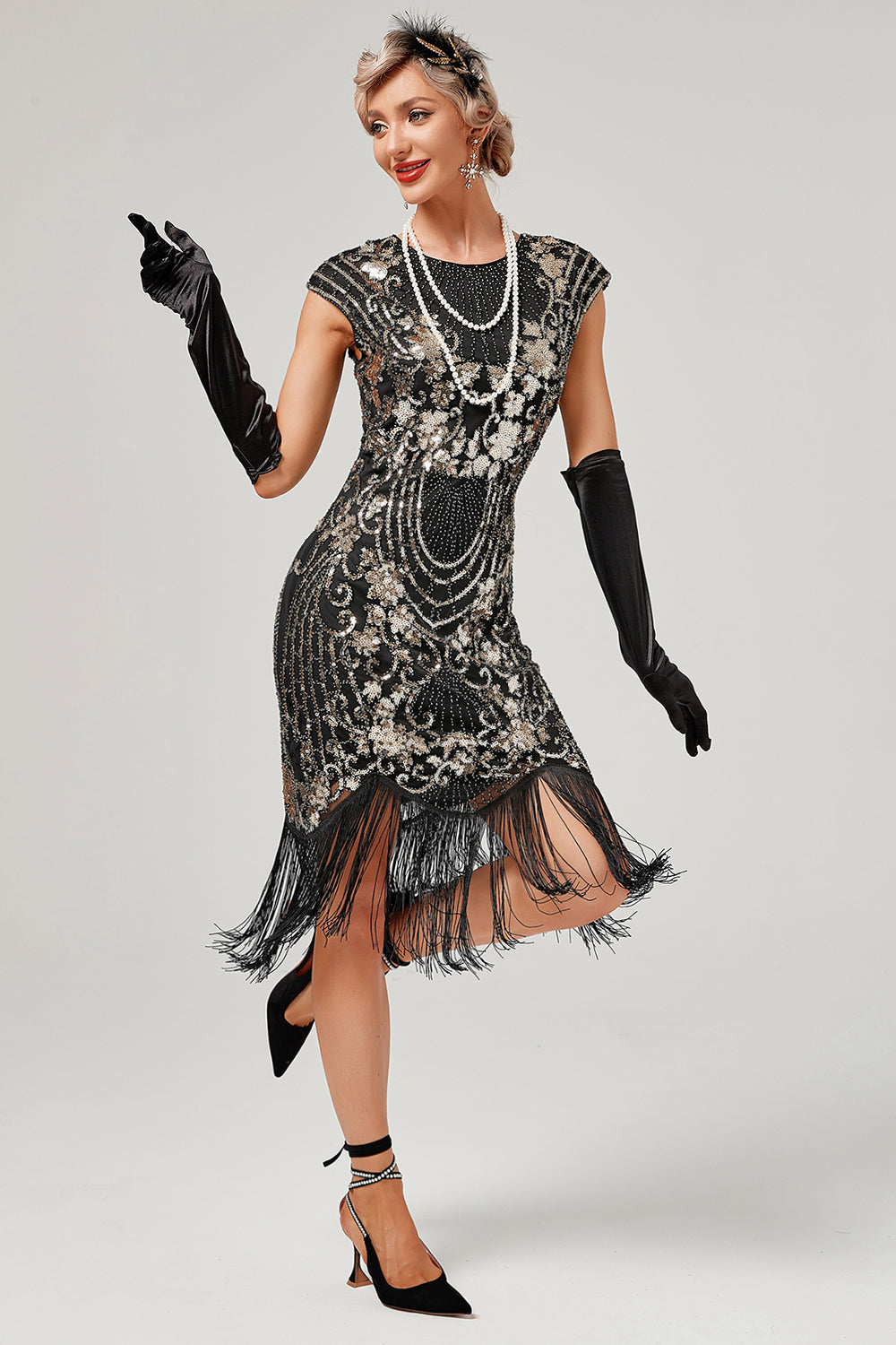 Broderie verte col rond broderie dorée des années 20 avec franges