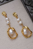 Boucles d’oreilles irrégulières Golden Pearl