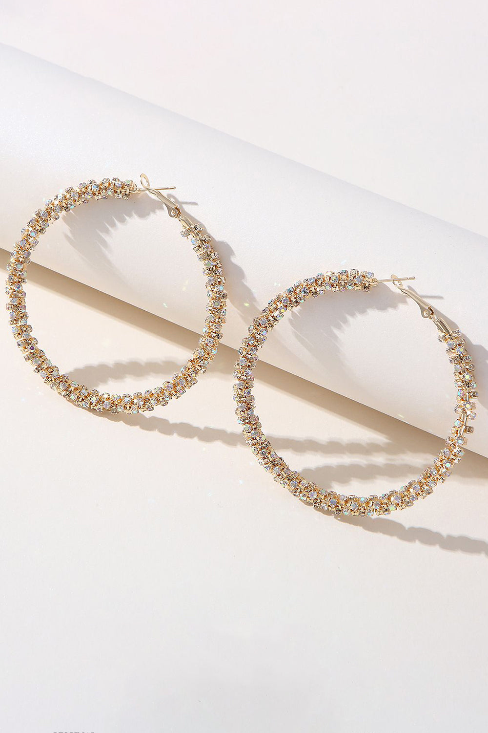 Boucles d’oreilles rondes en strass dorées