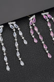 Boucles d’oreilles longues strass rose