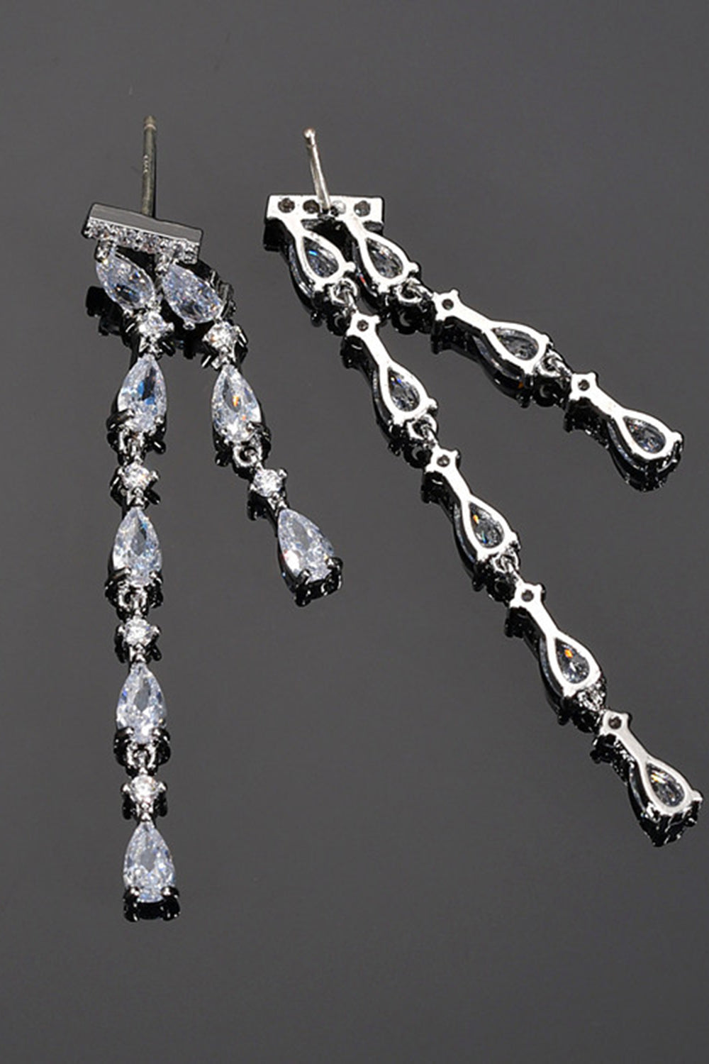 Boucles d’oreilles longues strass rose