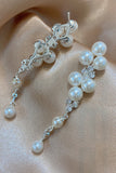 Boucles d’oreilles perles blanches
