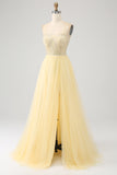 Robe de soirée jaune clair perlé en tulle avec fente