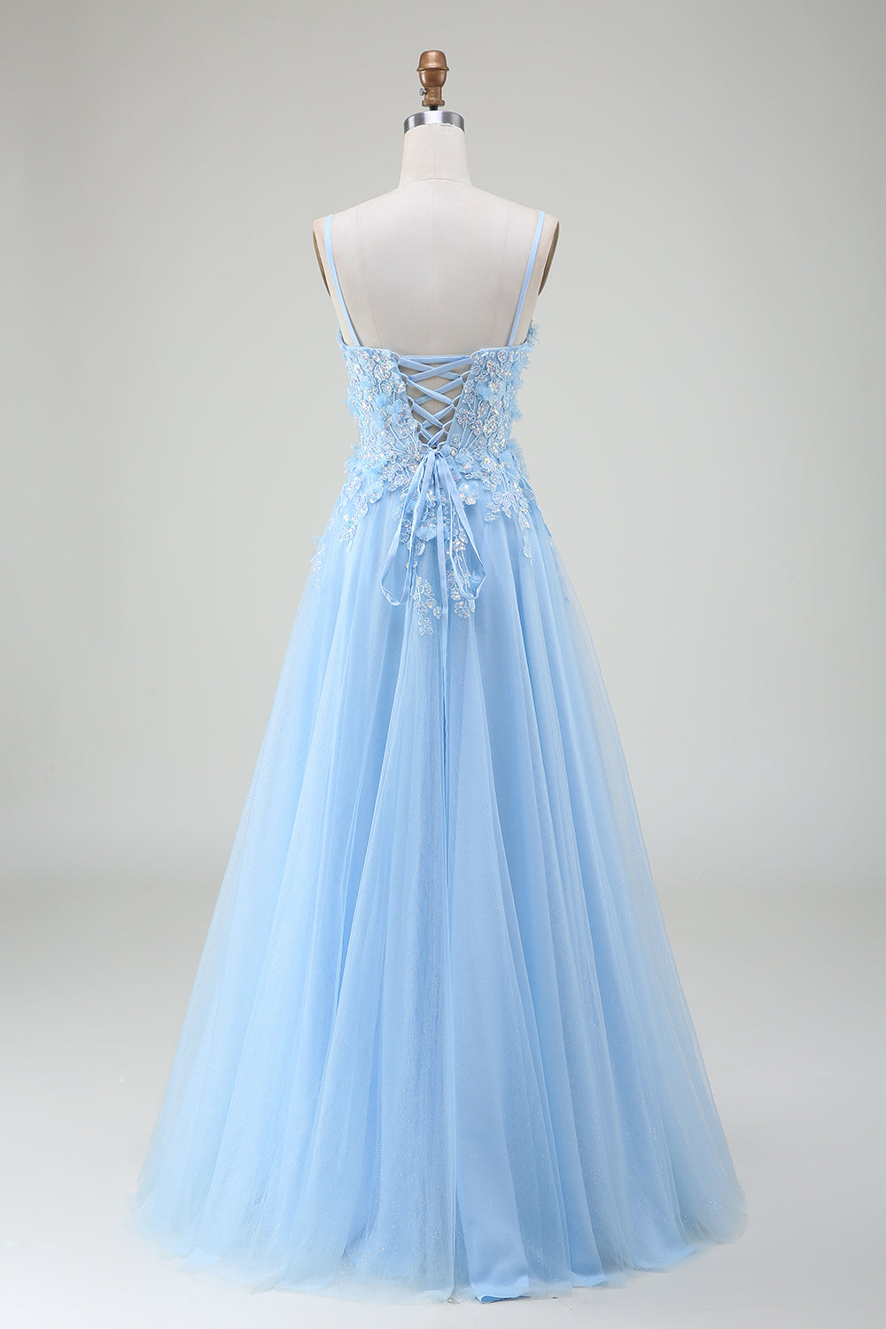 Robe de soirée bleu clair trapèze avec appliques