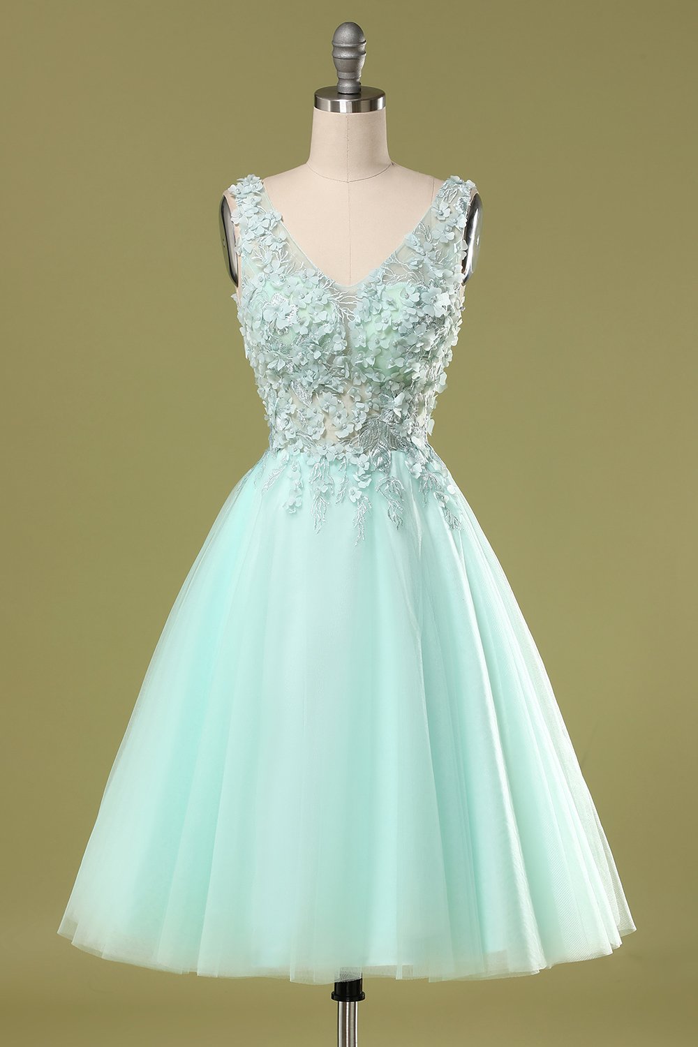 Robe de bal courte verte avec appliques