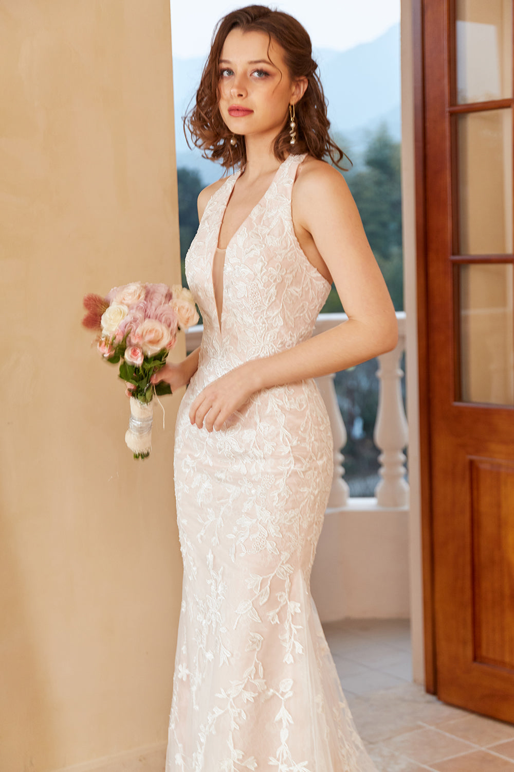 Mermaid Deep V Neck Robe de mariée en dentelle blanche avec appliques