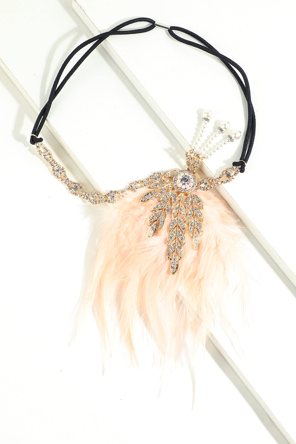 Bandeau à clapet perle plume noire des années 1920