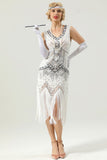Robe à paillettes noires et dorées des années 1920