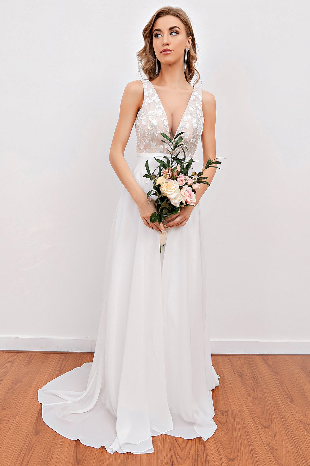 Robe de mariée broderie blanche