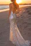 Robe longue formelle sirène dos nu argentée scintillante
