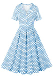 Robe vintage à pois à col revers bleu à manches courtes