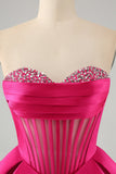 Jolie robe de bal corset en cœur fuchsia a ligne avec perles