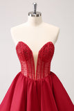 Robe de soirée court rouge à volants et sans bretelles avec perles