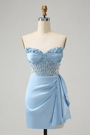 Robe de cocktail moulante bleue scintillante avec corset et perles