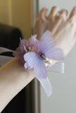 Elégant papillon violet bal poignet Corsage pour mariage