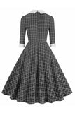 Robe noire à carreaux à revers vintage des années 50 avec demi-manches