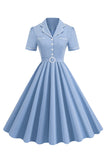 Robe bleue à revers trapèze vintage des années 1950 avec boutons