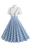 Robe vintage bleue à bretelles à pois et col claudine