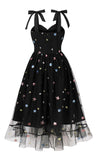 Robe vintage noire Pin Up des années 50 avec étoiles