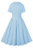 Robe vintage à pois à col revers bleu à manches courtes