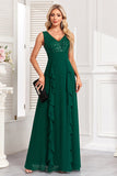 Robe de bal longue à paillettes vert foncé scintillante avec volants