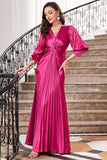 Robe de bal longue plissée fuchsia avec manches lanterne