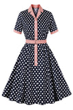 Robe Pin-up noire à pois roses des années 1950