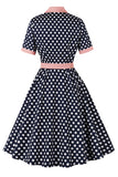 Robe Pin-up noire à pois roses des années 1950