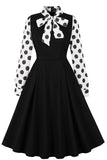 Robe noire à pois swing des années 1950 avec nœuds