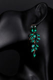 Boucles d’oreilles en cristal vert foncé en forme de larme