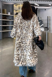 Manteau long en peau de mouton hirsute à imprimé léopard
