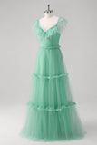 Robe de demoiselle d’honneur en tulle à plusieurs niveaux à col en V vert