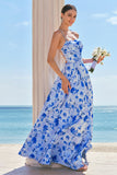 Robe longue de demoiselle d’honneur à bretelles spaghetti florales bleues avec fente