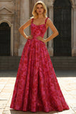 Robe de soirée longue fuchsia ligne A bretelles fines imprimé floral avec fente