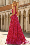 Robe de soirée longue fuchsia ligne A bretelles fines imprimé floral avec fente