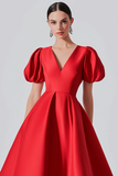 Robe formelle en satin rouge à manches bouffantes